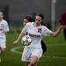 Dexter junior Rachel Spencer settles the ball in the second half of the game against Huron on Tuesday, April 23. Daniel Brenner I AnnArbor.com